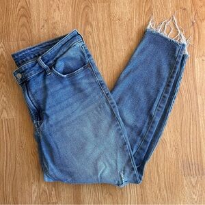 Mid-Rise Raw Hem Rockstar Super Skinny Blue Denim Jeans